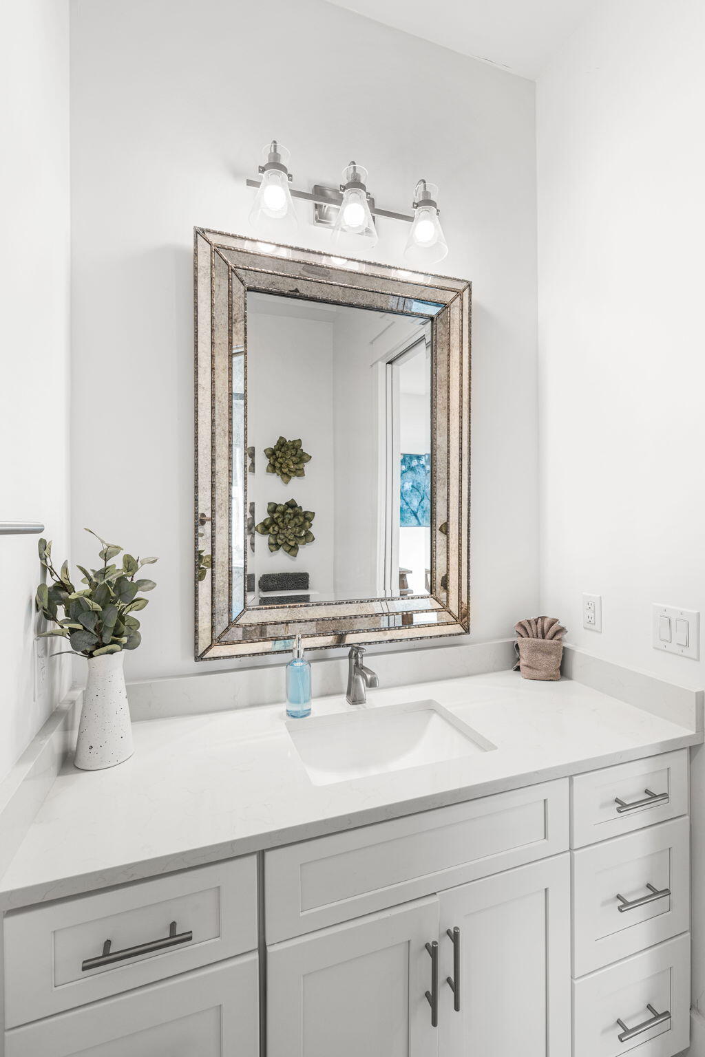 35 Cote D Azur Drive Santa Rosa Beach, FL 32459 - Photo 21 of 54 a sink with a mirror and vanity