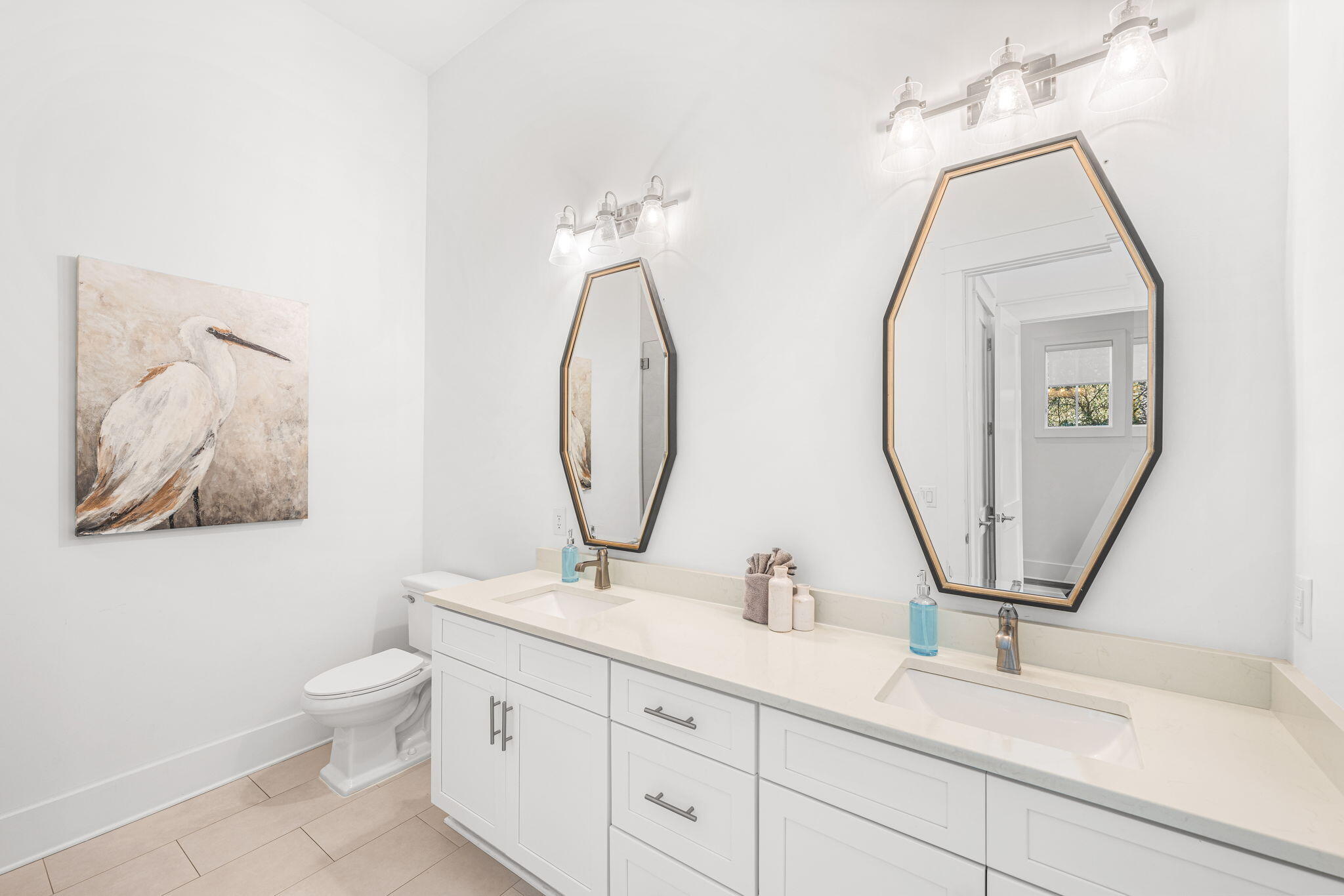 35 Cote D Azur Drive Santa Rosa Beach, FL 32459 - Photo 24 of 54 a bathroom with a double vanity sink and a mirror