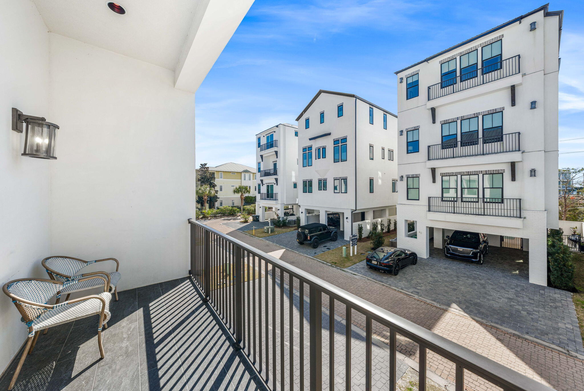 35 Cote D Azur Drive Santa Rosa Beach, FL 32459 - Photo 26 of 54 a view of balcony with couch and chairs