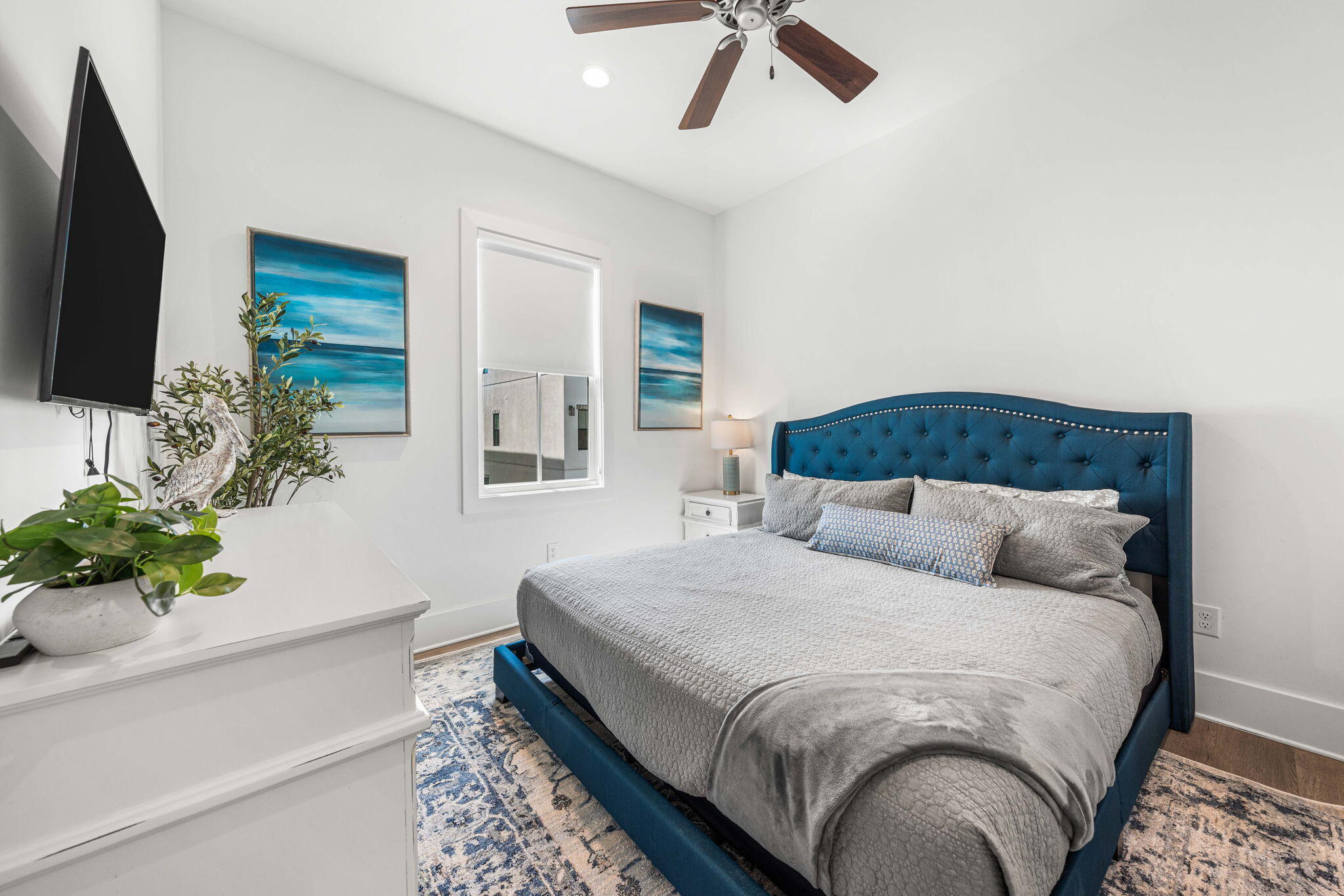 35 Cote D Azur Drive Santa Rosa Beach, FL 32459 - Photo 31 of 54 a bedroom with a large bed and a flat screen tv