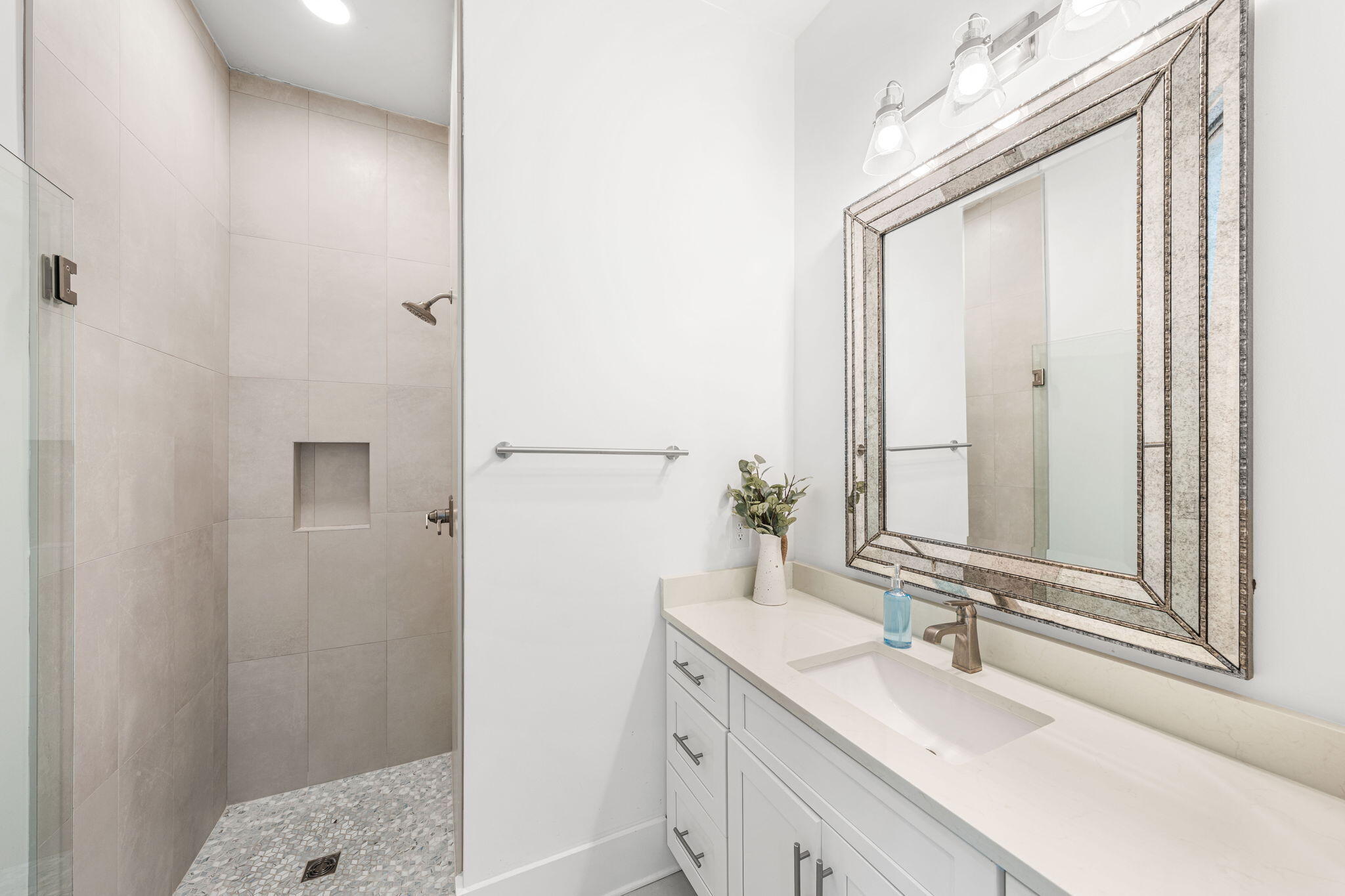 35 Cote D Azur Drive Santa Rosa Beach, FL 32459 - Photo 36 of 54 a bathroom with a granite countertop sink and a mirror