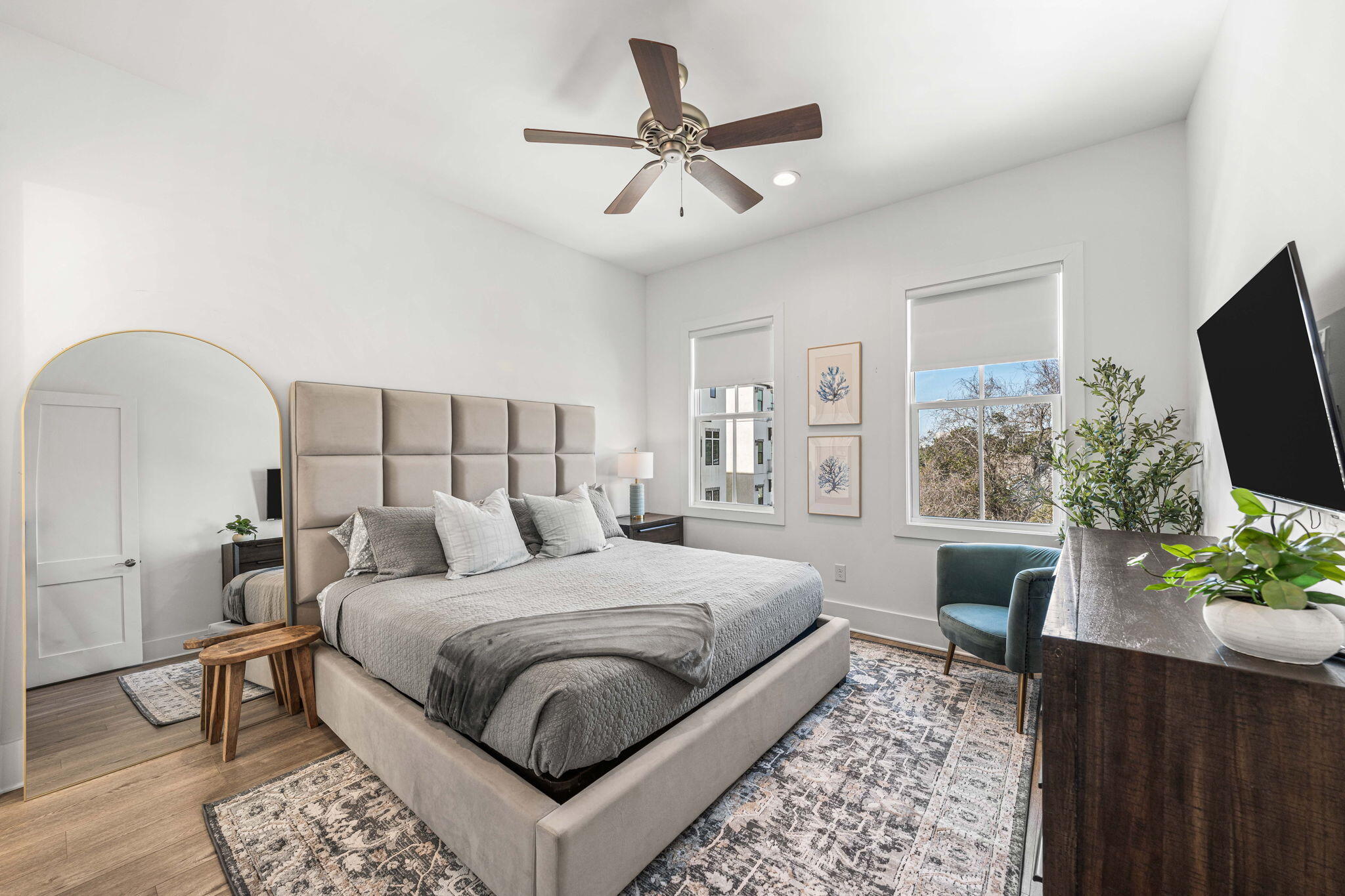 35 Cote D Azur Drive Santa Rosa Beach, FL 32459 - Photo 38 of 54 a bedroom with a bed a couch and a flat screen tv