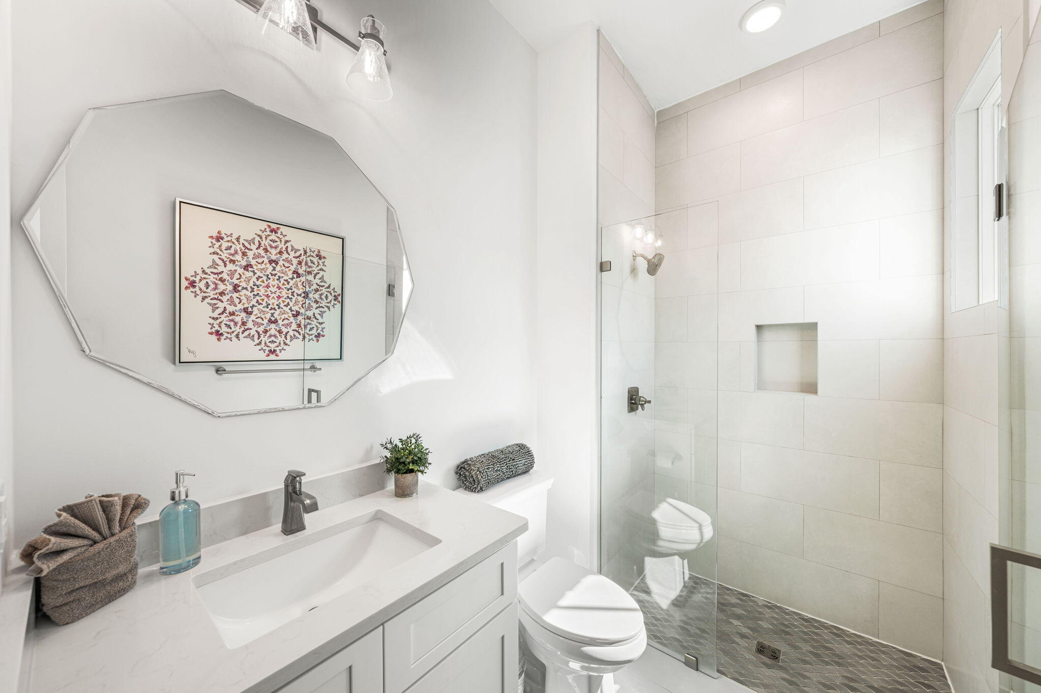 35 Cote D Azur Drive Santa Rosa Beach, FL 32459 - Photo 41 of 54 a bathroom with a sink a toilet a shower and a mirror