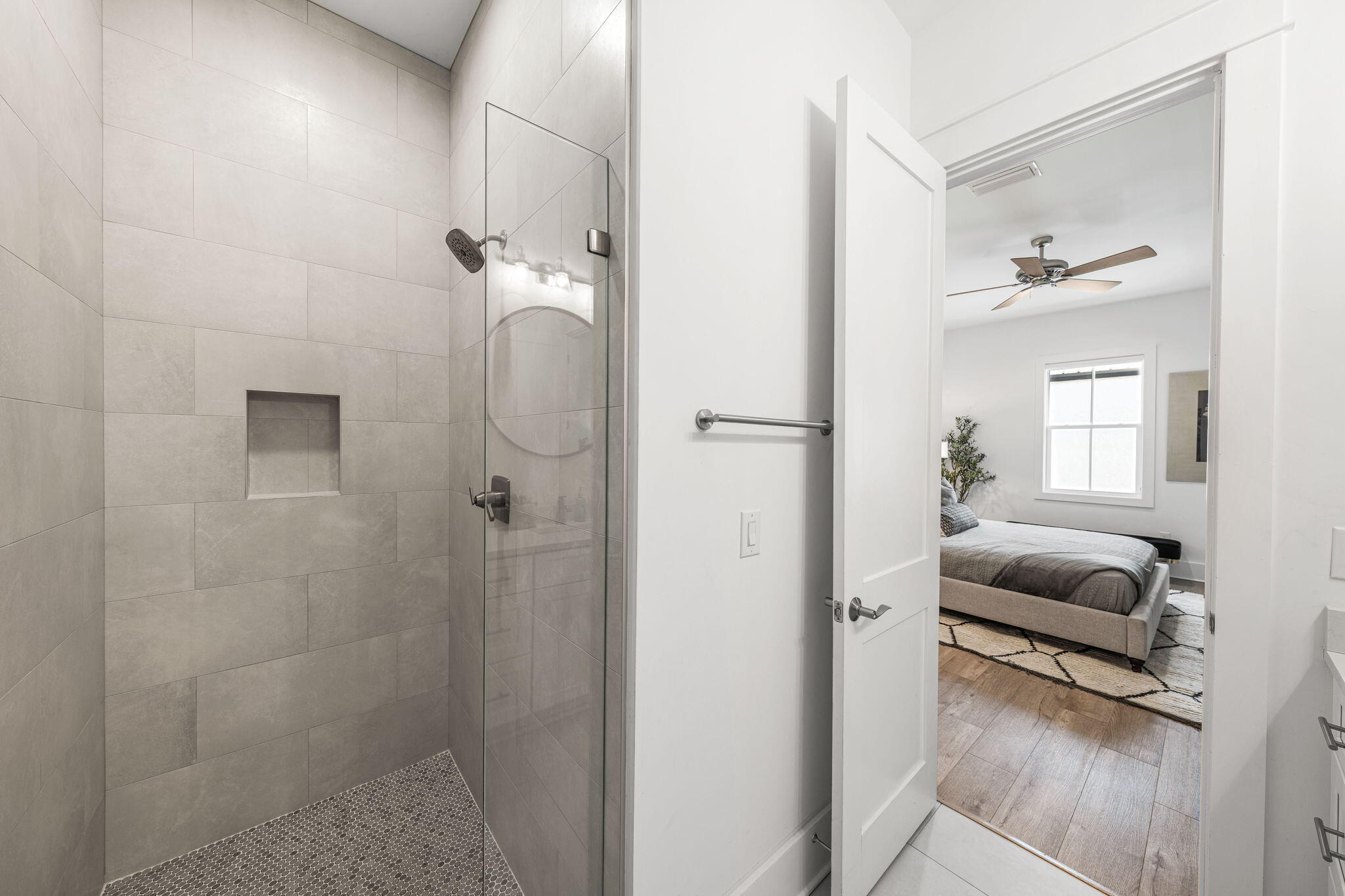 35 Cote D Azur Drive Santa Rosa Beach, FL 32459 - Photo 44 of 54 a en suite bathroom with a granite countertop sink a mirror and shower