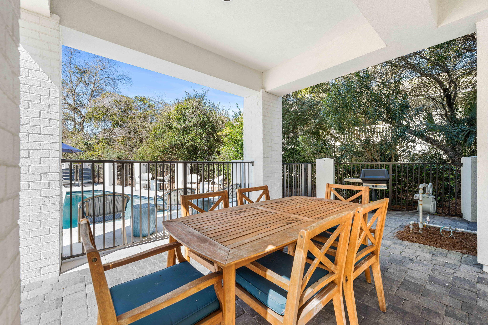 35 Cote D Azur Drive Santa Rosa Beach, FL 32459 - Photo 47 of 54 a view of a patio with a table and chairs