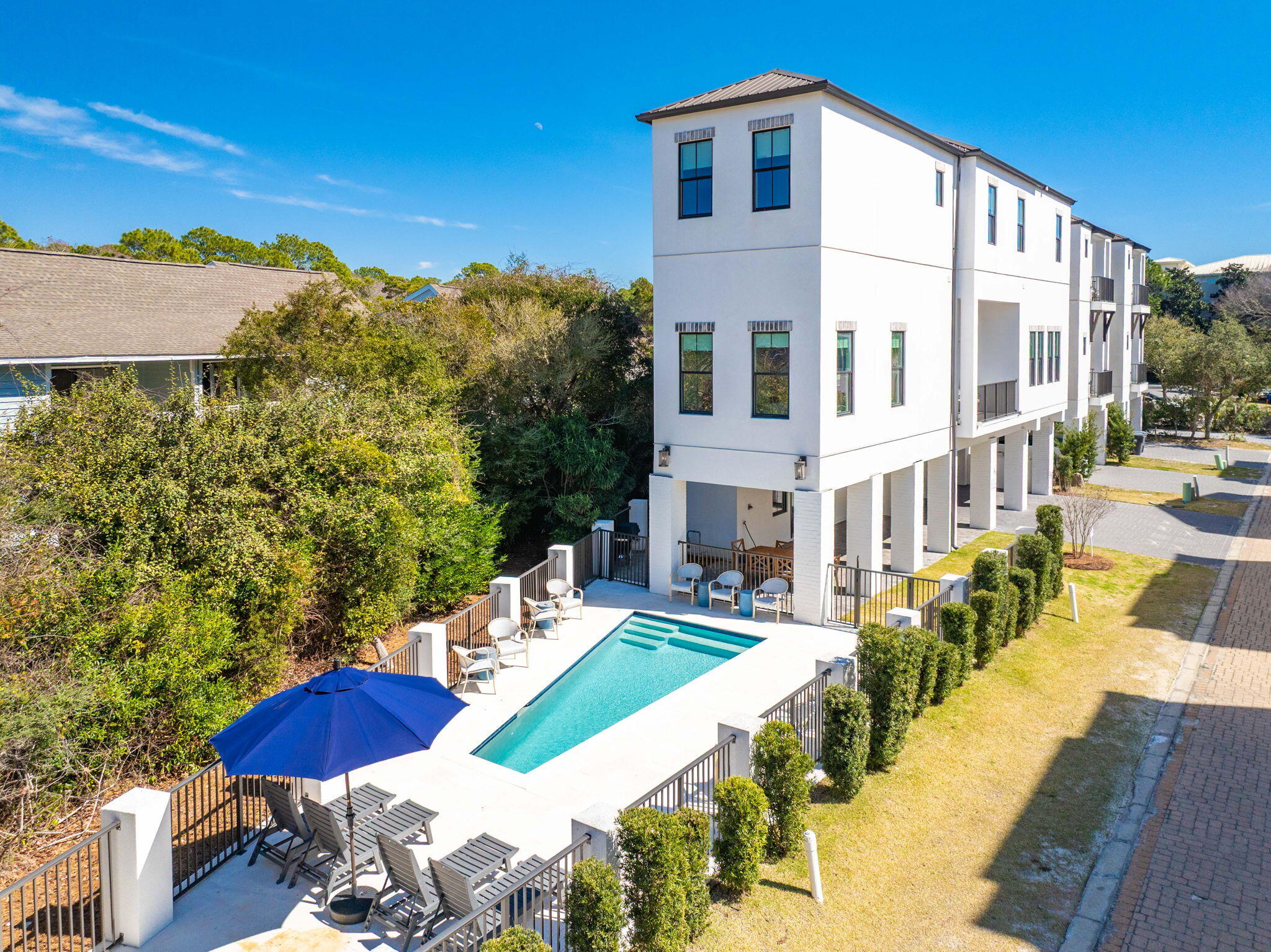 35 Cote D Azur Drive Santa Rosa Beach, FL 32459 - Photo 5 of 54 a view of multiple house with yard and furniture
