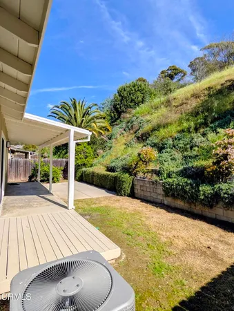 a view of a backyard with plants