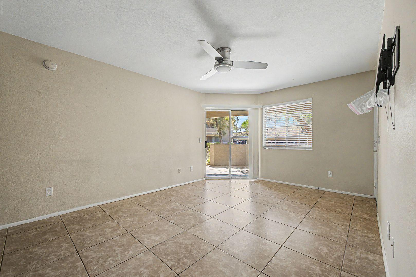 1720 East Thunderbird Road, Unit 1086 Phoenix, AZ 85022 - Photo 4 of 32 a view of an empty room with a window