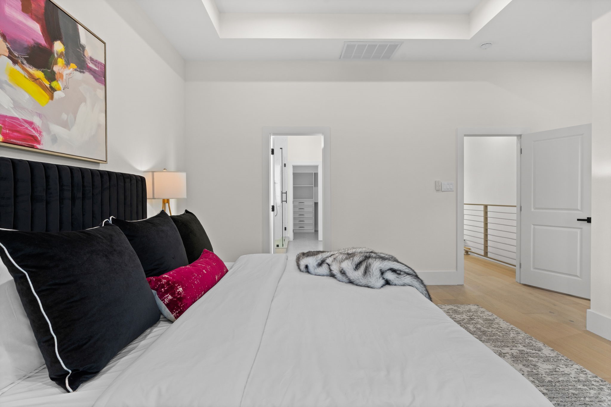 1622 Mable Street Houston, TX 77023 - Photo 16 of 25 a bedroom with a bed and wooden floor