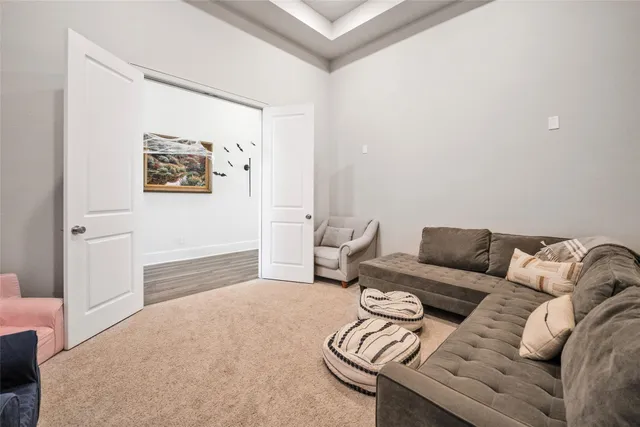 a living room with furniture and a couch