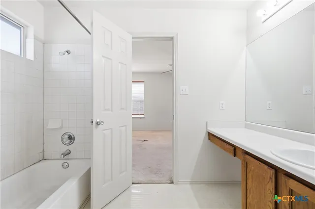 a bathroom with a bathtub