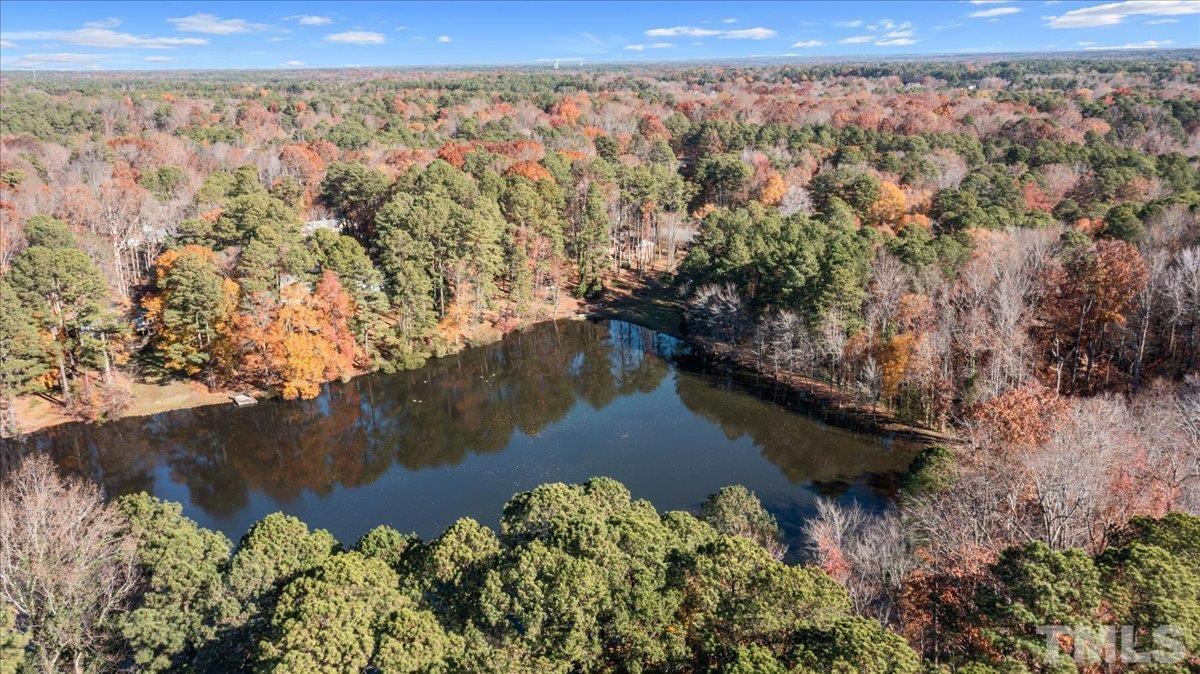 8913 Oneal Road Raleigh, NC 27613 - Photo 1 of 39 a view of a lake with a mountain in the background