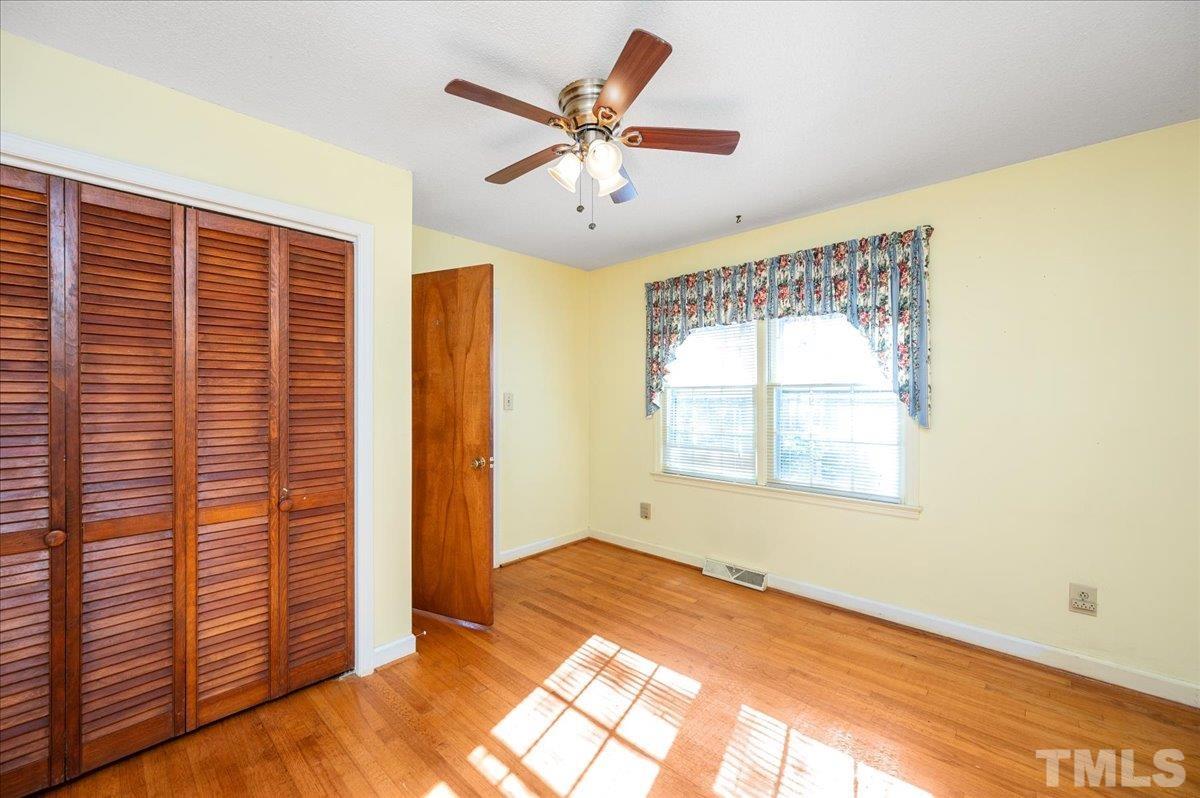 8913 Oneal Road Raleigh, NC 27613 - Photo 26 of 39 a view of an empty room with a window