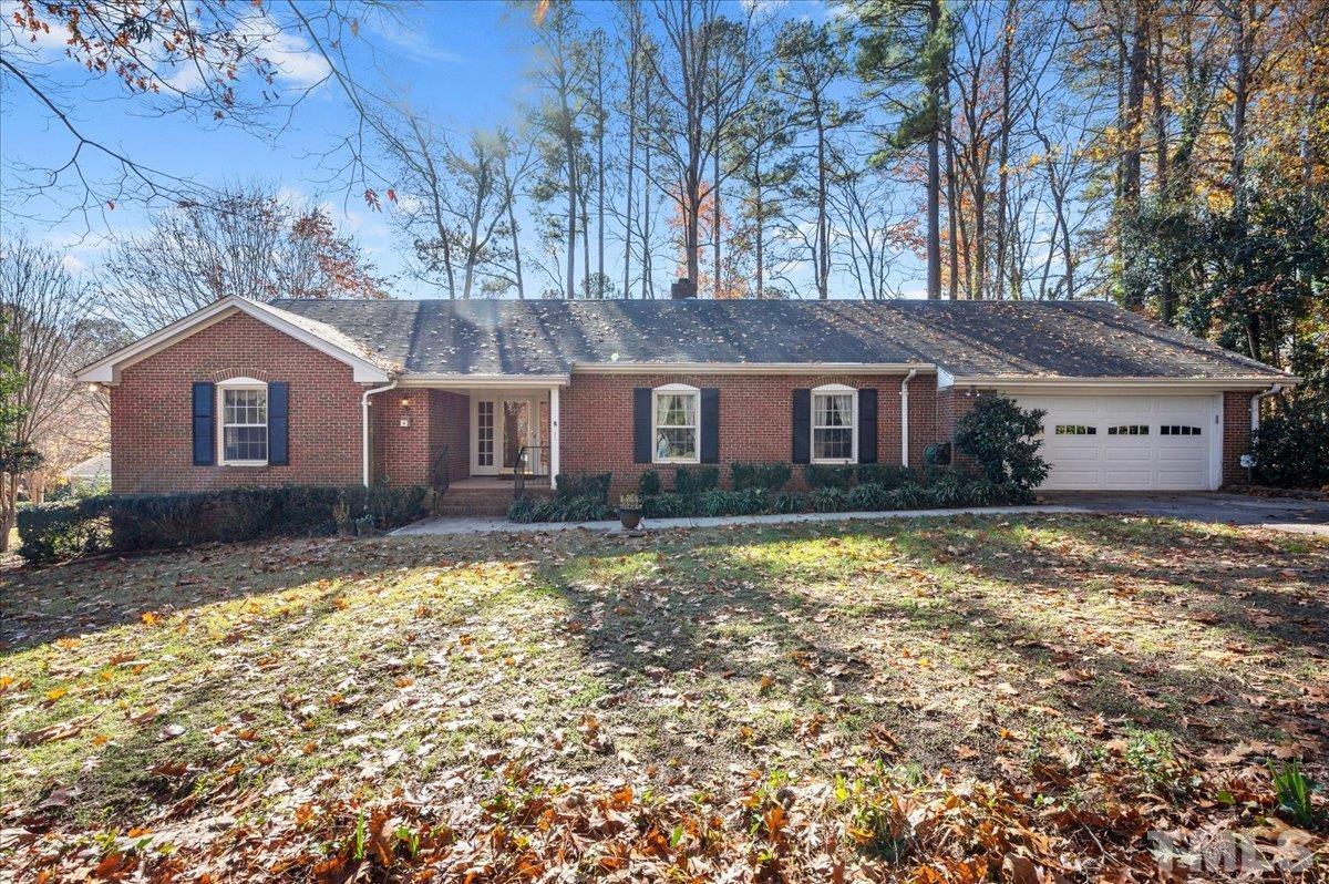 8913 Oneal Road Raleigh, NC 27613 - Photo 6 of 39 a front view of a house with a yard