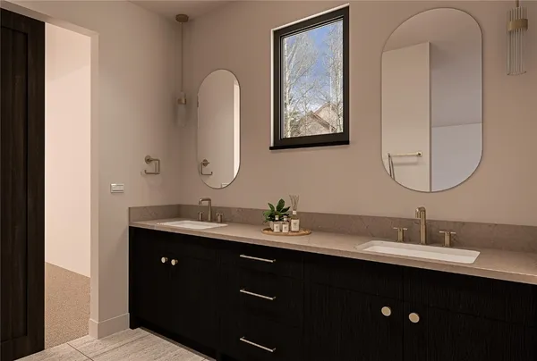 a bathroom with a double vanity sink and a mirror