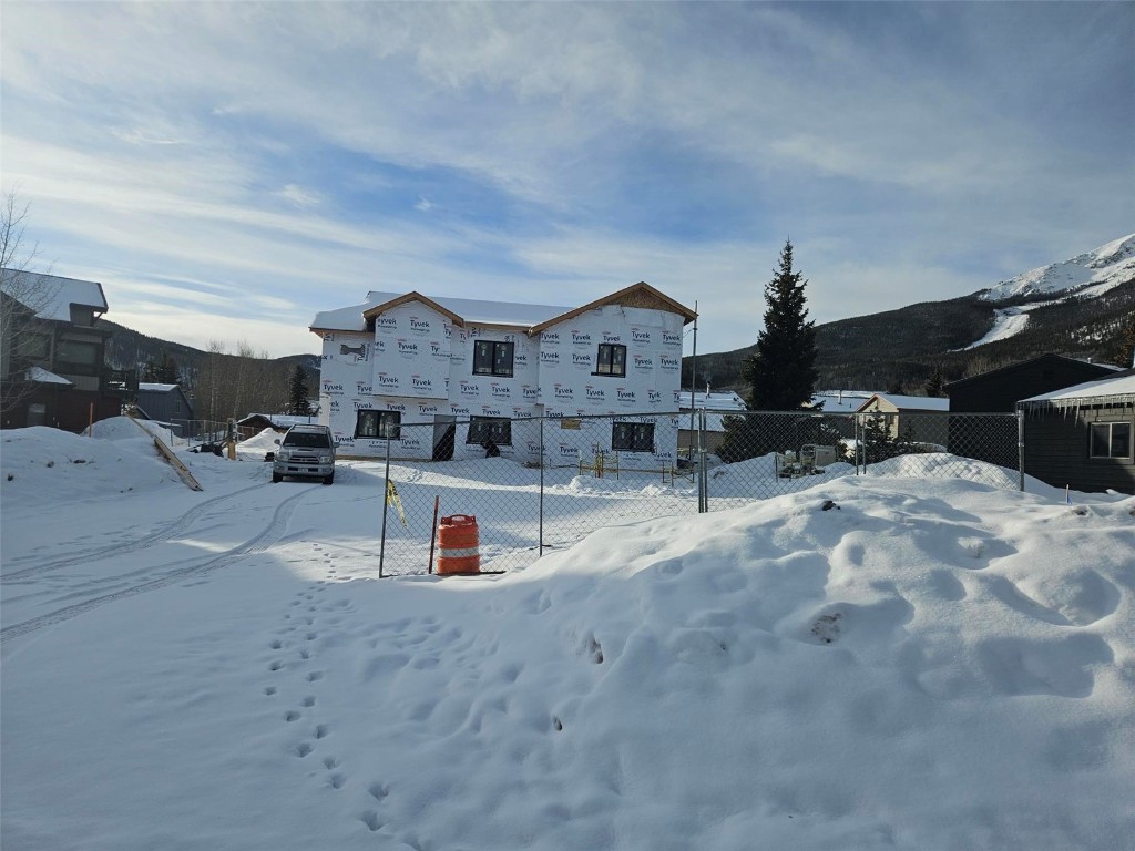 706 Frisco Street, Unit A Frisco, CO 80443 - Photo 8 of 8 a view of a house with a snow in the yard