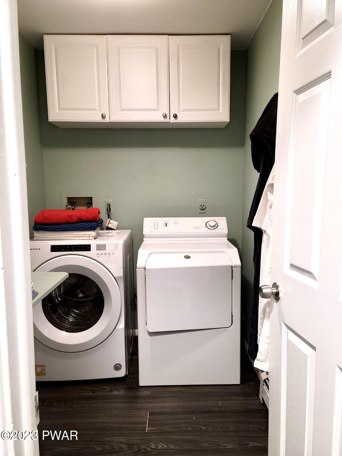 146 Roundhill Road Dingmans Ferry, PA 18328 - Photo 24 of 53 a utility room with dryer and washer