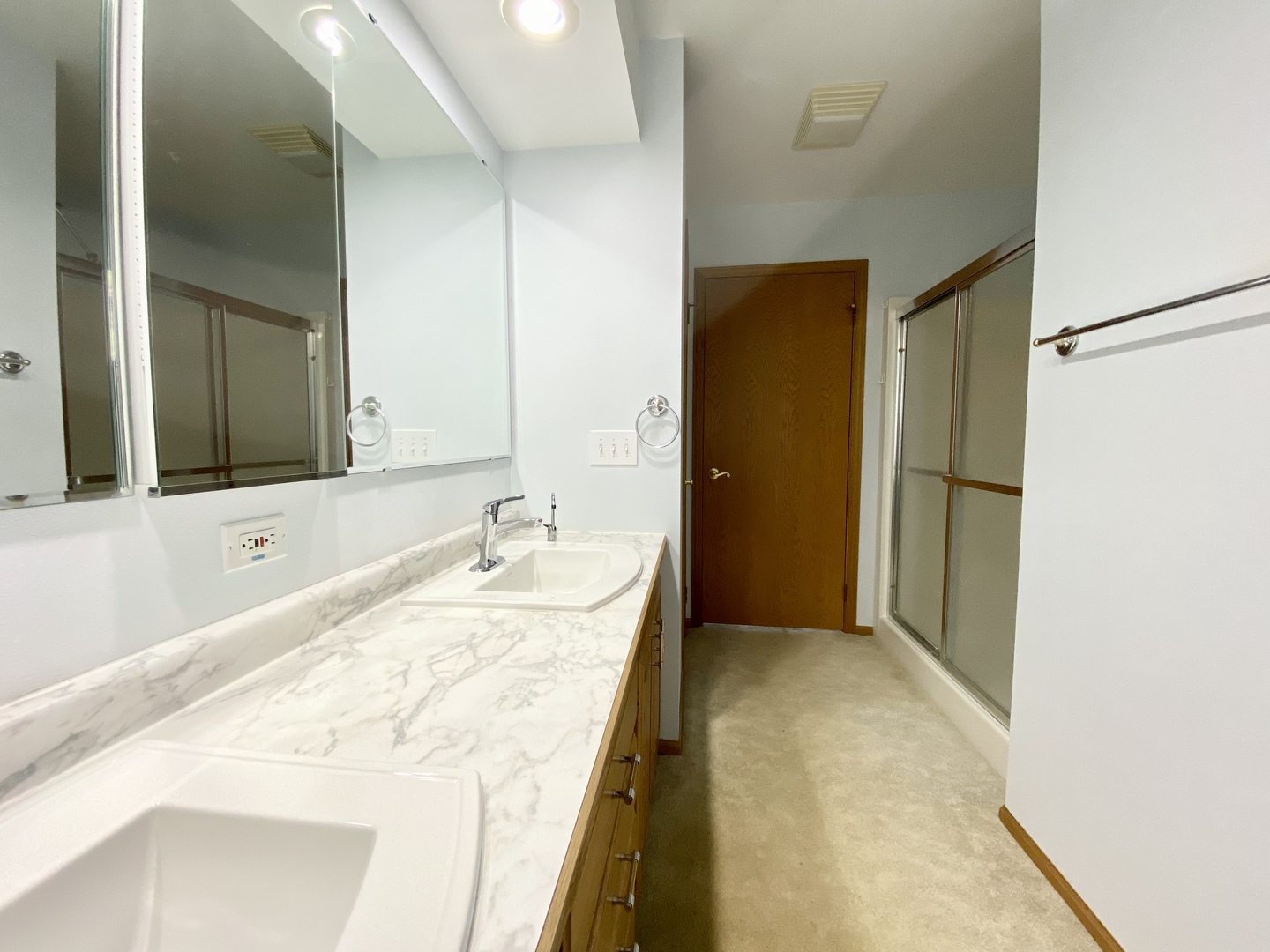 7905 Renee Rue Dixon, IL 61021 - Photo 11 of 23 a bathroom with a tub sink and mirror