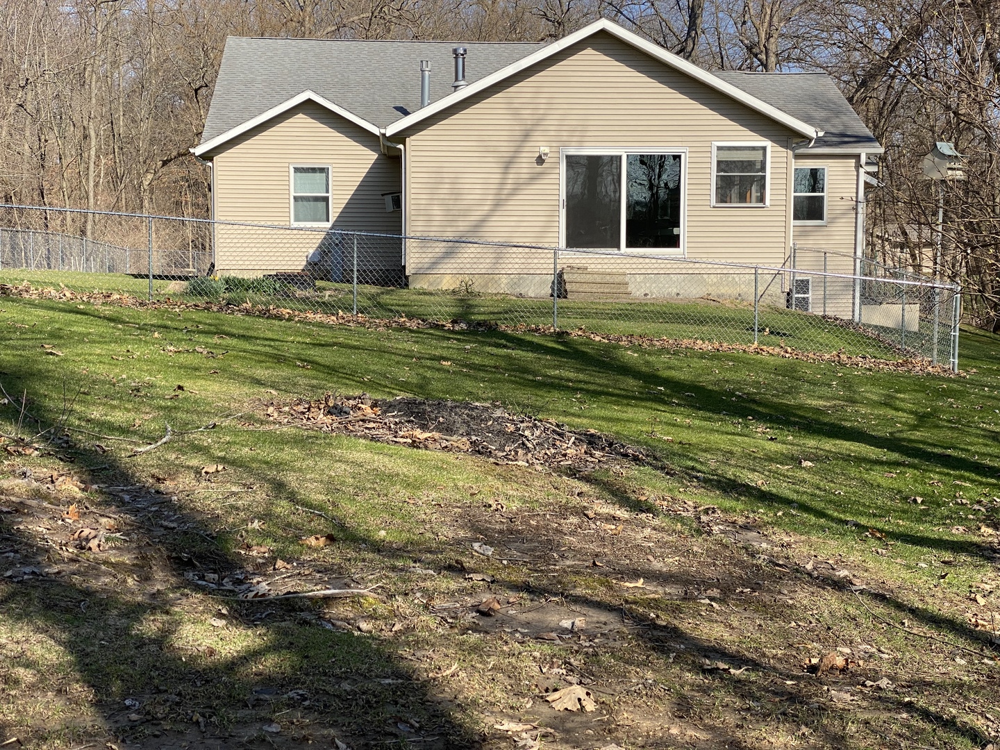 7905 Renee Rue Dixon, IL 61021 - Photo 22 of 23 a view of a house with a yard