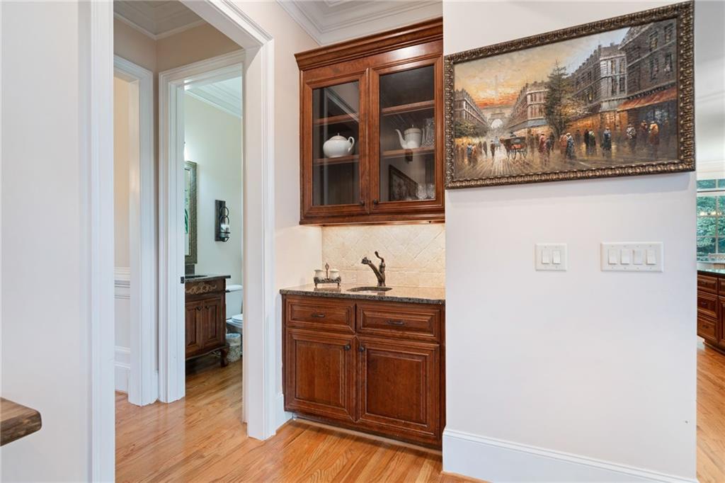 1750 Cone Flower Way Suwanee, GA 30024 - Photo 16 of 58 a bathroom with a sink and a mirror