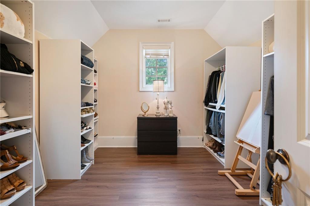 1750 Cone Flower Way Suwanee, GA 30024 - Photo 27 of 58 a view of a workspace with furniture and a window