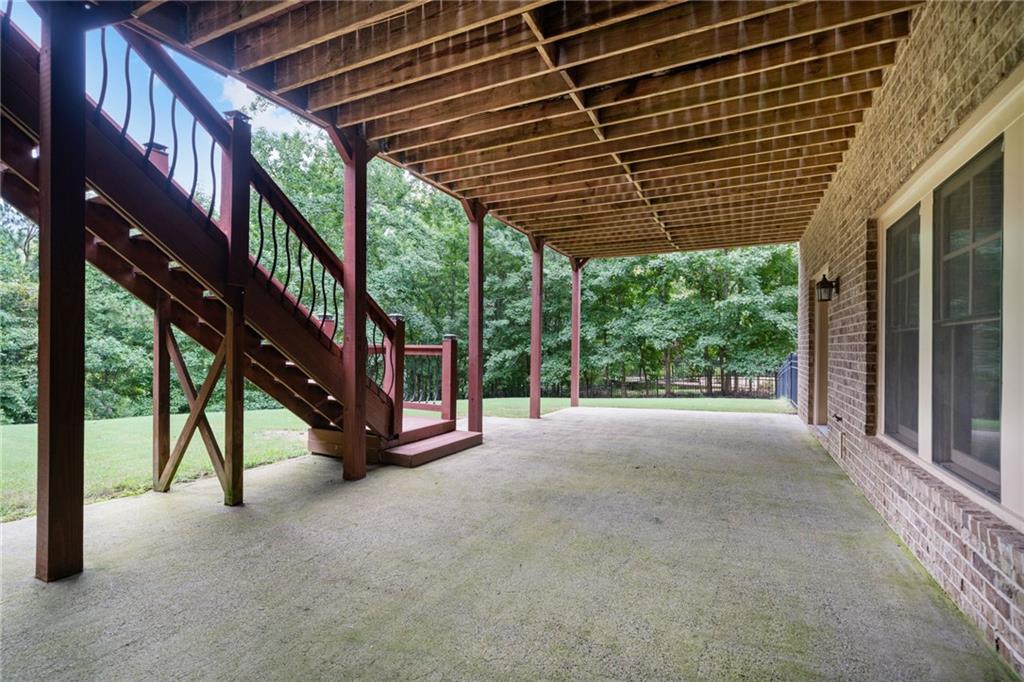 1750 Cone Flower Way Suwanee, GA 30024 - Photo 47 of 58 a view of an empty room with a large window