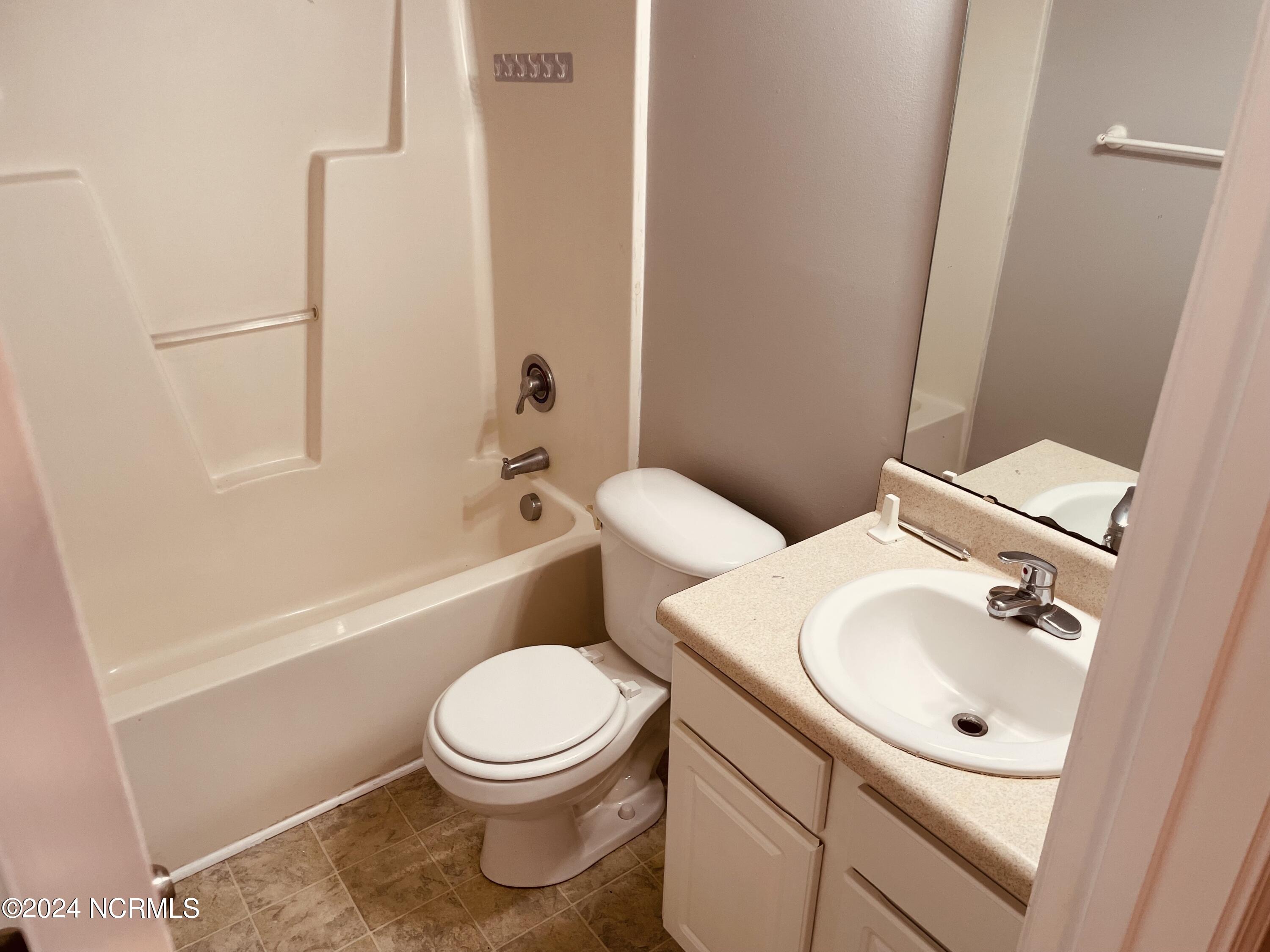 112 Apache Trail Havelock, NC 28532 - Photo 6 of 21 HALF BATH ON FIRST FLOOR