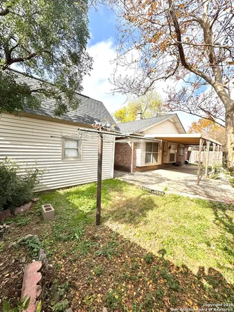 a view of a backyard of a house