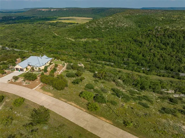 a view of a lake from a yard