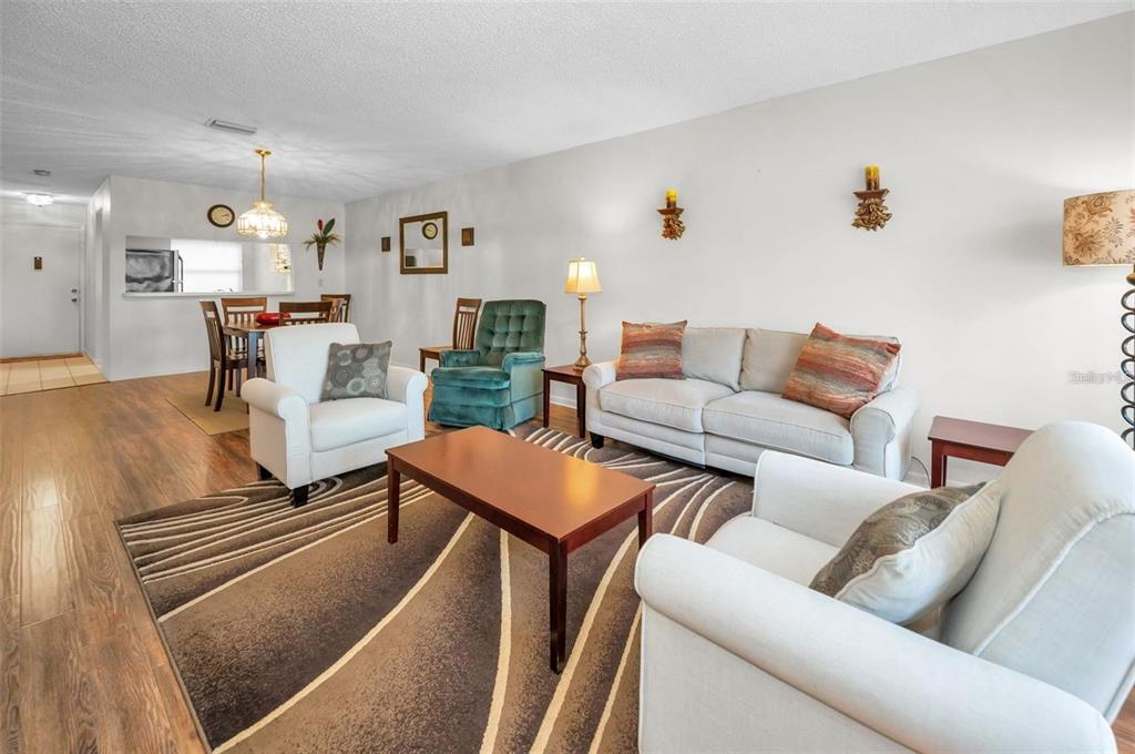3521 Teeside Drive New Port Richey, FL 34655 - Photo 17 of 73 a living room with furniture and wooden floor