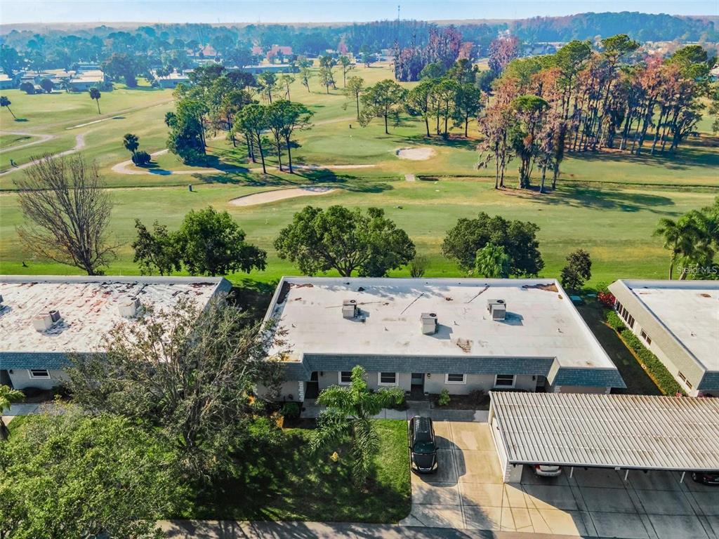 3521 Teeside Drive New Port Richey, FL 34655 - Photo 8 of 73 an aerial view of a house with a yard lake view and mountain view