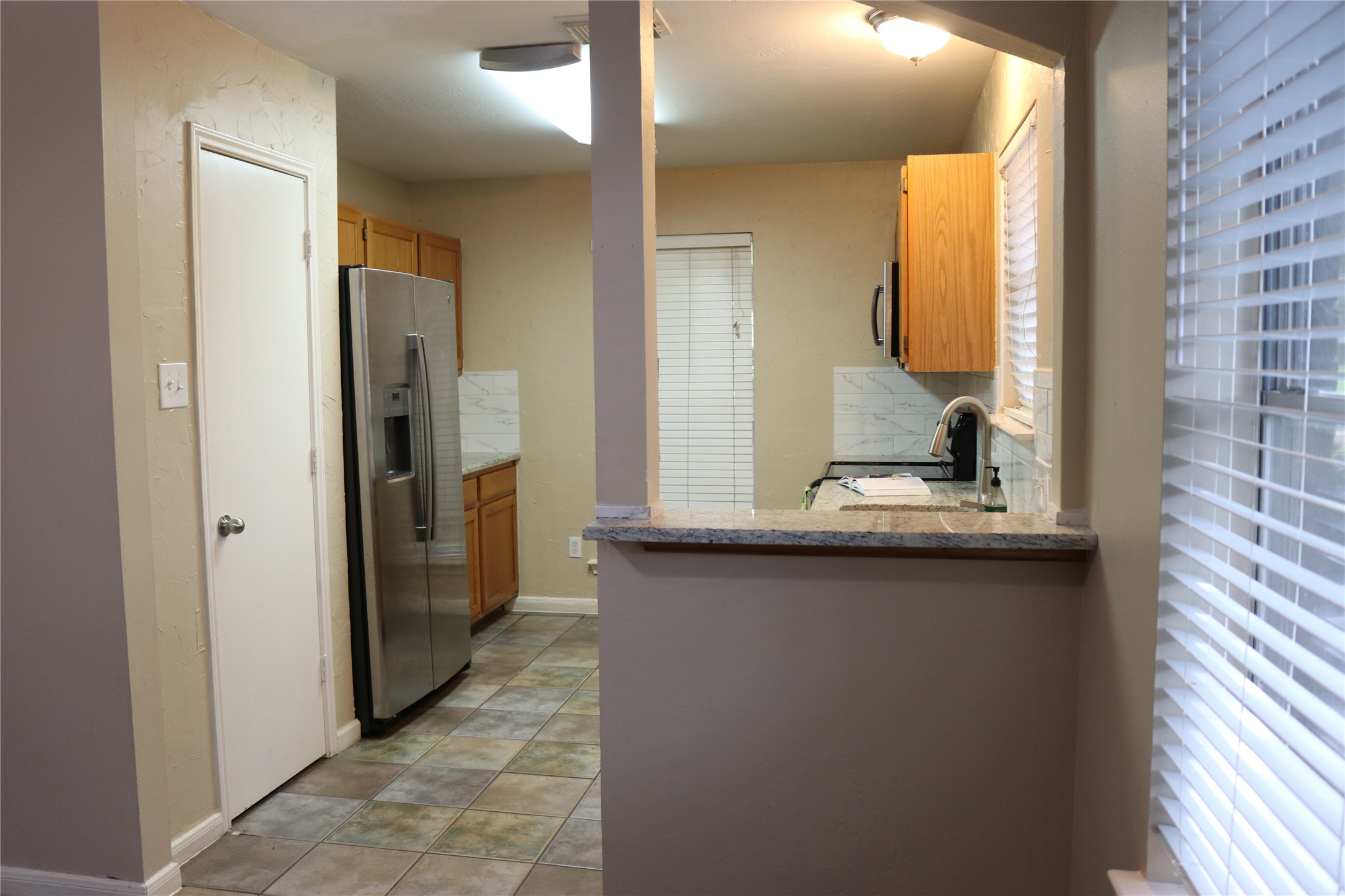 10926 Waterview Circle Montgomery, TX 77356 - Photo 8 of 15 Durable tile in your kitchen