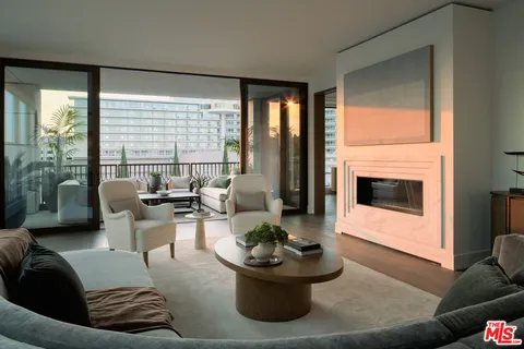 a balcony with furniture and city view
