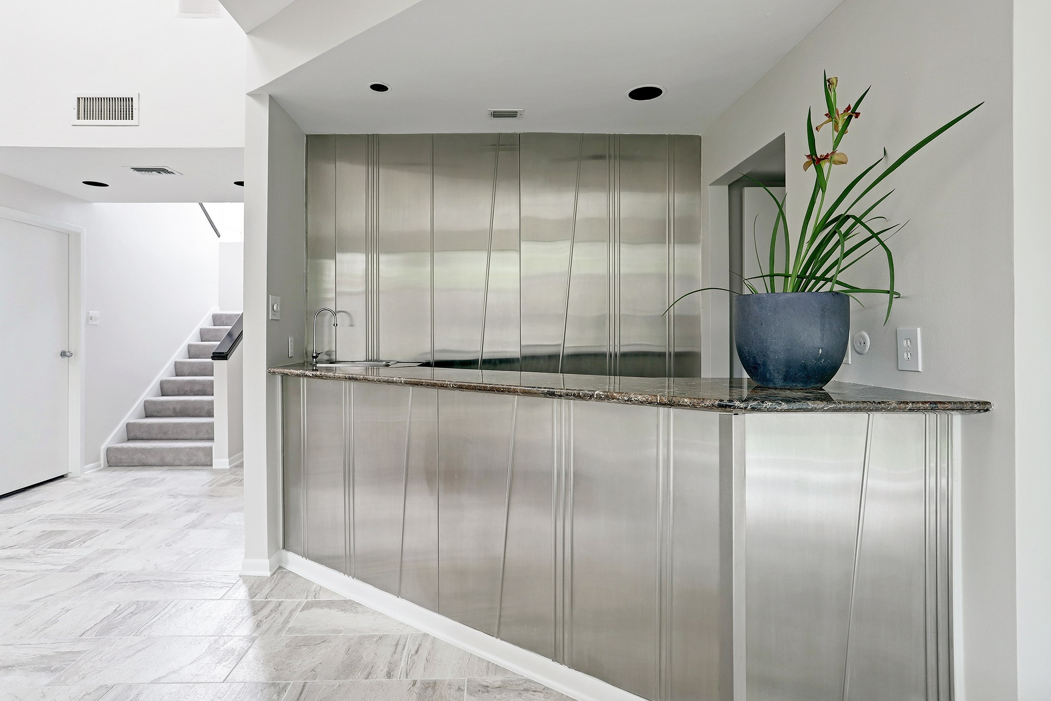 5300 Mercer Street, Unit 9 West University Place, TX 77005 - Photo 8 of 23 Stunning. You will love this well placed wet bar with built-in wine refrigerator.