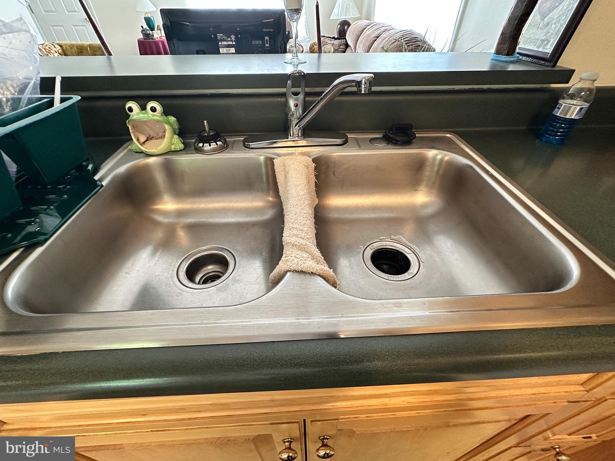 901 Merchant Street Coatesville, PA 19320 - Photo 12 of 36 a close view of sink and washer