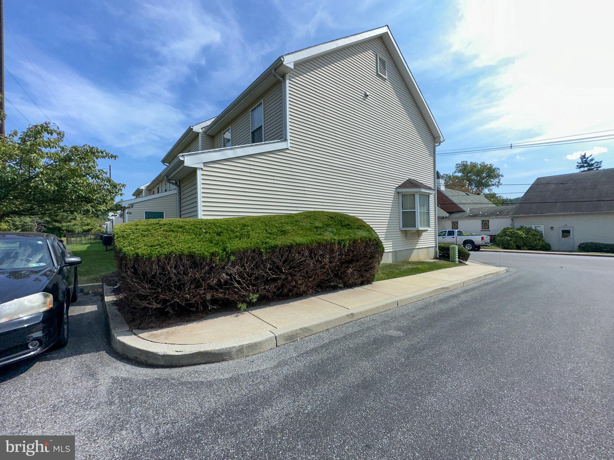 901 Merchant Street Coatesville, PA 19320 - Photo 4 of 36 a view of a house with a street