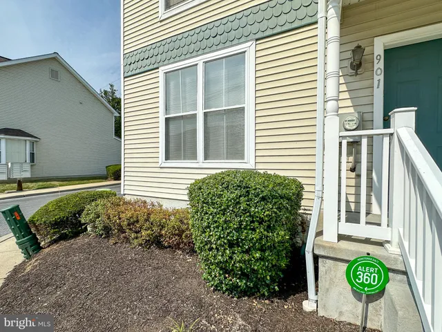a view of a house with a street