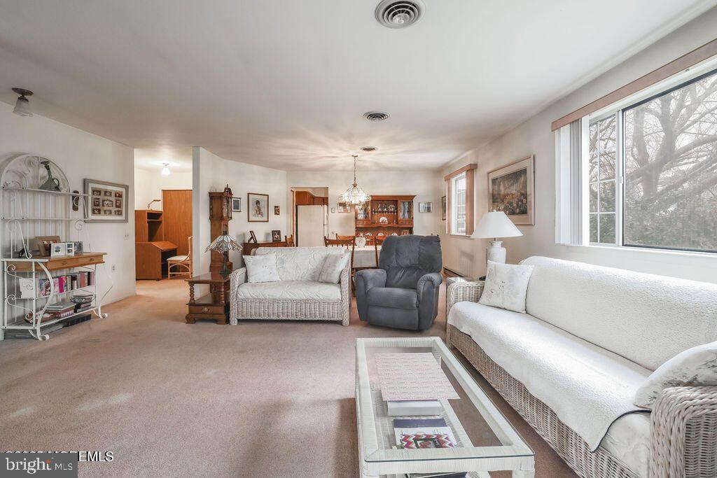 3B Alpine Road, Unit B Manchester Township, NJ 08759 - Photo 4 of 5 a living room with furniture and a large window