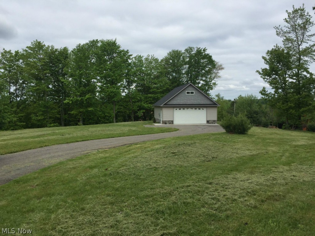 9433 Lowmiller Road Minerva, OH 44657 - Photo 1 of 4 GORGEOUS 4 ACRE PARCEL. PARTIALLY WOODED. BEAUTIFUL 24 X 36 GARAGE IS THE START TO THE LOCATION OF YOUR DREAMS!
