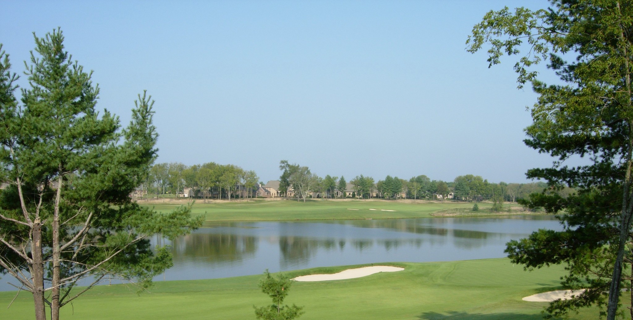 886 Fairington Way Gallatin, TN 37066 - Photo 12 of 22 a view of a lake with a large building in the back