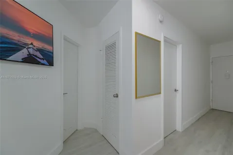 a view of a hallway with elevator