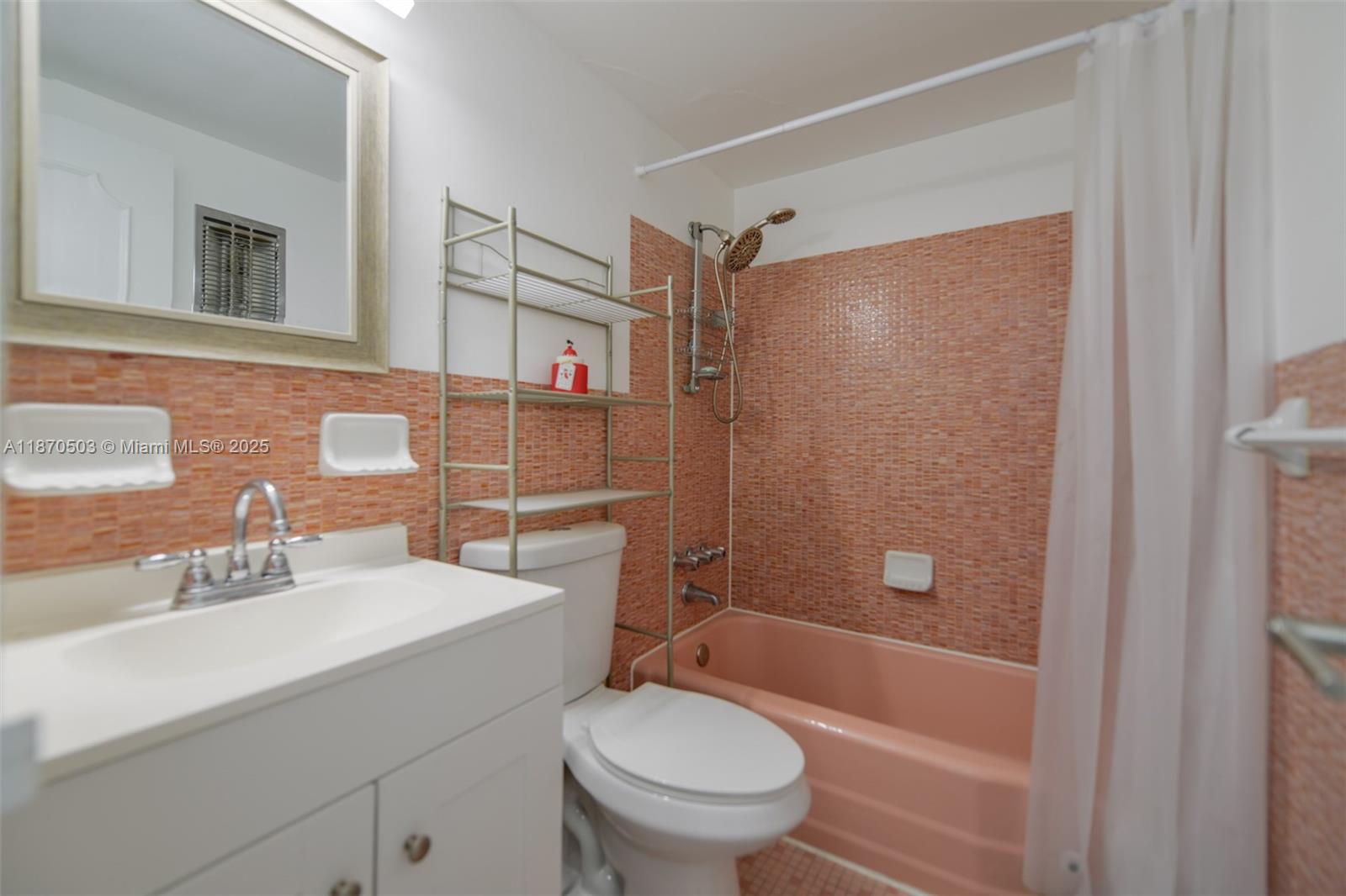 1936 South Ocean Drive, Unit 3C Hallandale Beach, FL 33009 - Photo 16 of 23 a bathroom with a sink a toilet and shower