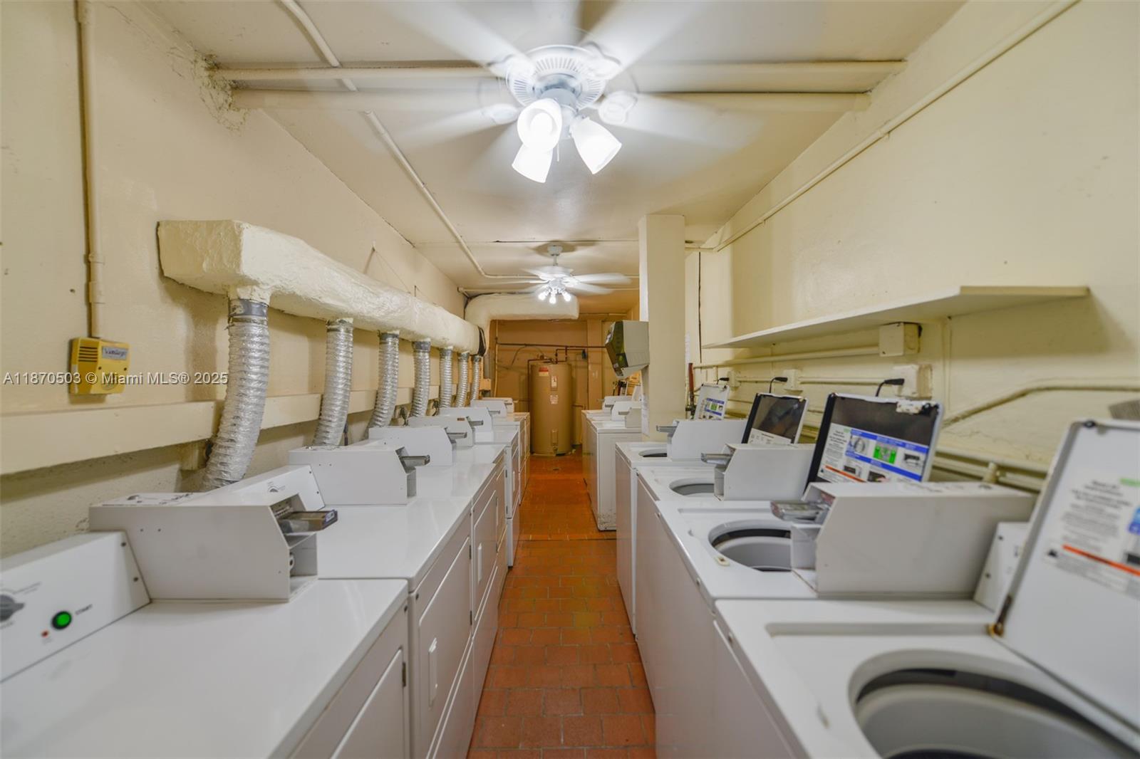 1936 South Ocean Drive, Unit 3C Hallandale Beach, FL 33009 - Photo 17 of 23 a living room with furniture and a chandelier