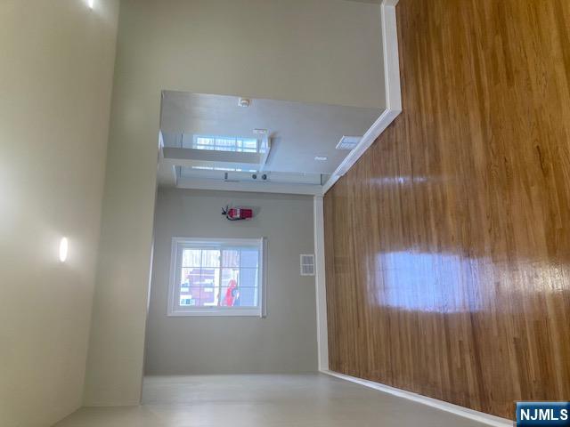 1288 Teaneck Road, Unit 3 Teaneck, NJ 07666 - Photo 5 of 17 a view of a room with wooden floor