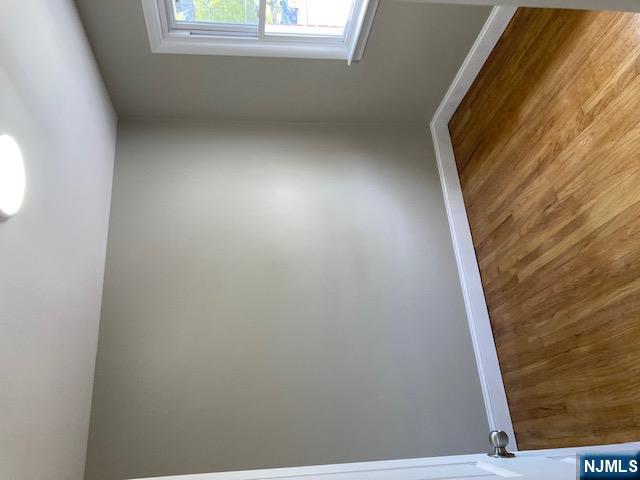 1288 Teaneck Road, Unit 3 Teaneck, NJ 07666 - Photo 9 of 17 wooden floor in an empty room