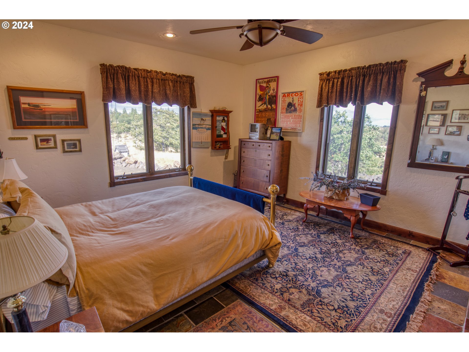 287 Munson Prairie Road Goldendale, WA 98620 - Photo 43 of 48 a bed sitting in a bedroom next to a window