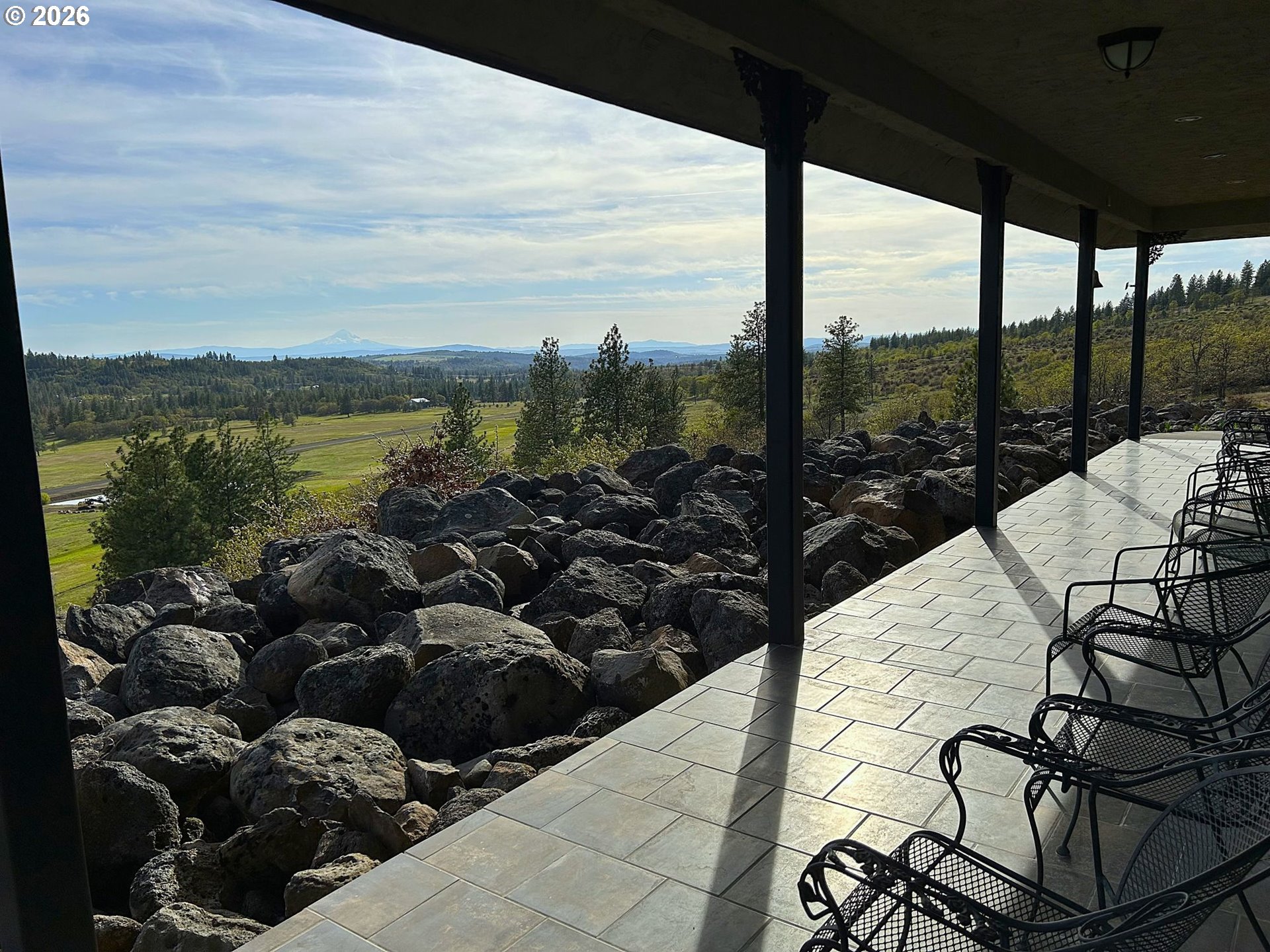 287 Munson Prairie Road Goldendale, WA 98620 - Photo 47 of 48 a view of a terrace with furniture and lake view