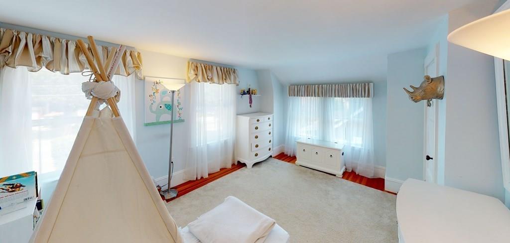 89 Spring Street Stoneham, MA 02180 - Photo 16 of 29 a bed room with a bed and a window