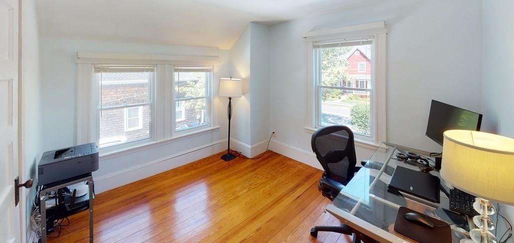 89 Spring Street Stoneham, MA 02180 - Photo 17 of 29 a bedroom with bed and a window