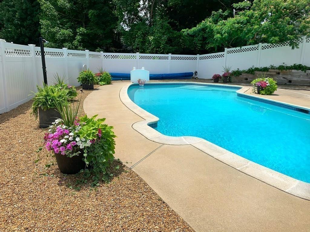 89 Spring Street Stoneham, MA 02180 - Photo 21 of 29 a view of a backyard